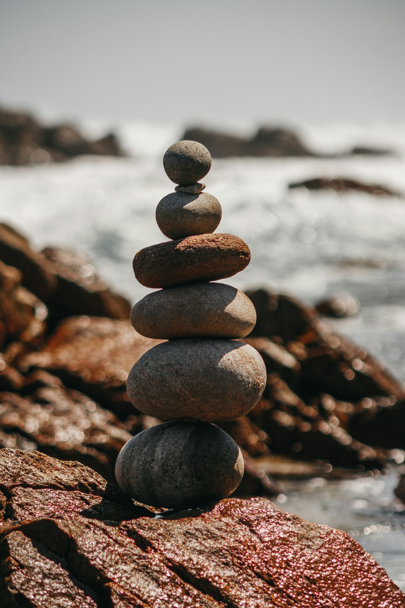 Balanced stones beside the sea